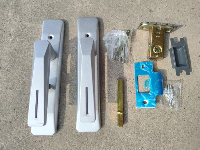 Handles, lock body and matching hardware laid out for checking